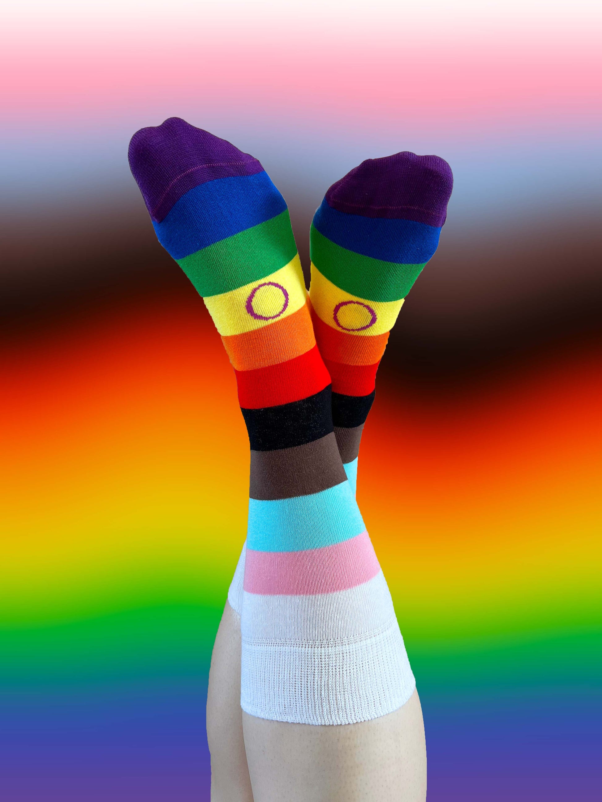 Unisex adults Progress Pride Socks. These Progressive Striped Flag socks have been created with love to support your feet and your “sole”. To assist your true authentic self when you’re walking with purpose, pride, and style. Our range of Genderqueer Pride Socks aim to make the world a brighter and more loving place. 