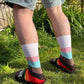 Unisex adults Progress Pride Socks. These Progressive Striped Flag socks have been created with love to support your feet and your “sole”. To assist your true authentic self when you’re walking with purpose, pride, and style. Our range of Genderqueer Pride Socks aim to make the world a brighter and more loving place. 