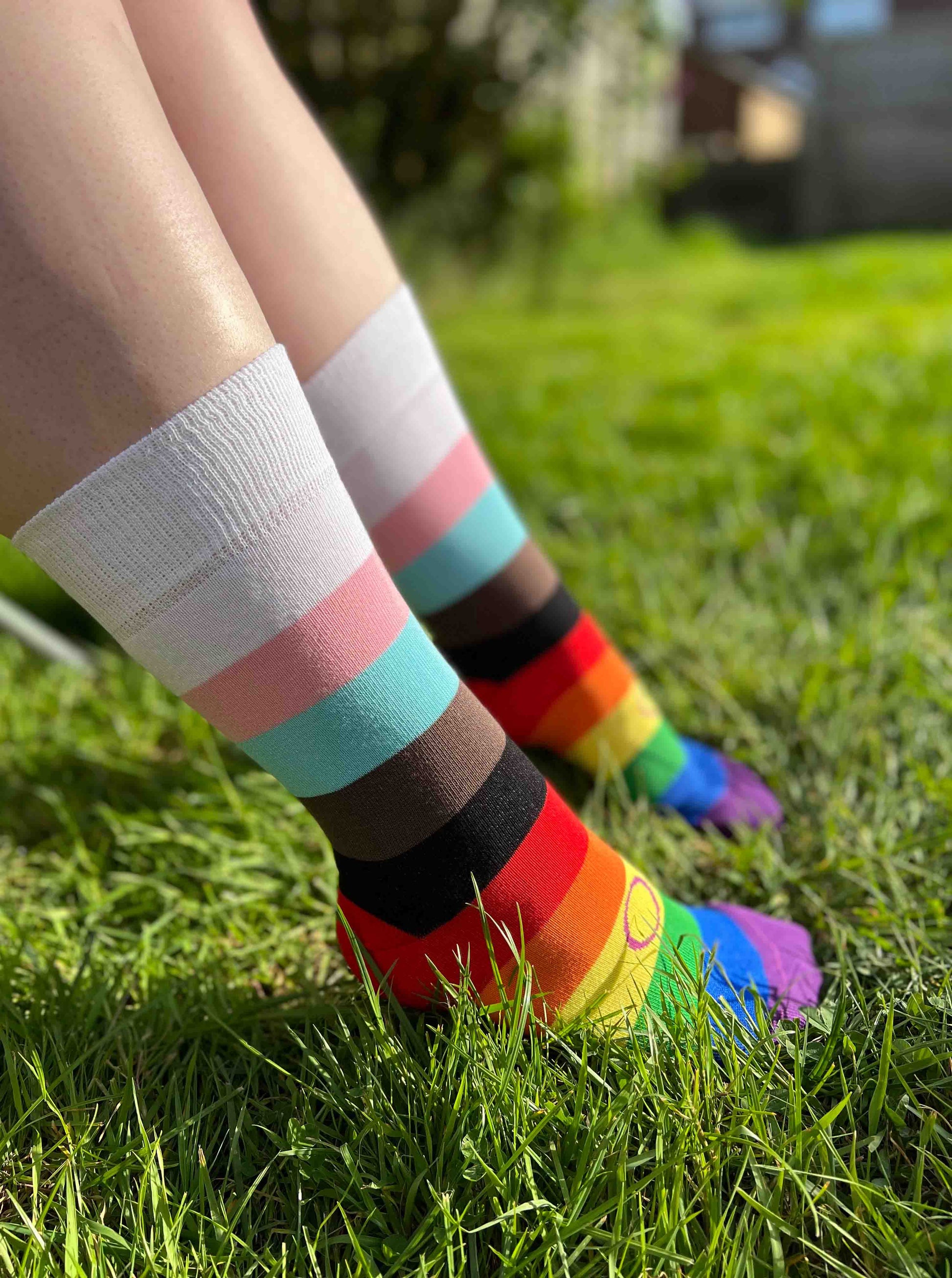 Unisex adults Progress Pride Socks. These Progressive Striped Flag socks have been created with love to support your feet and your “sole”. To assist your true authentic self when you’re walking with purpose, pride, and style. Our range of Genderqueer Pride Socks aim to make the world a brighter and more loving place. 